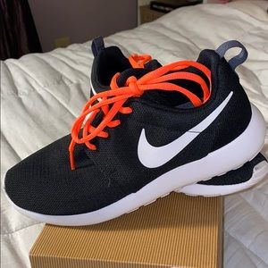 Nike roshe black and white with pink laces